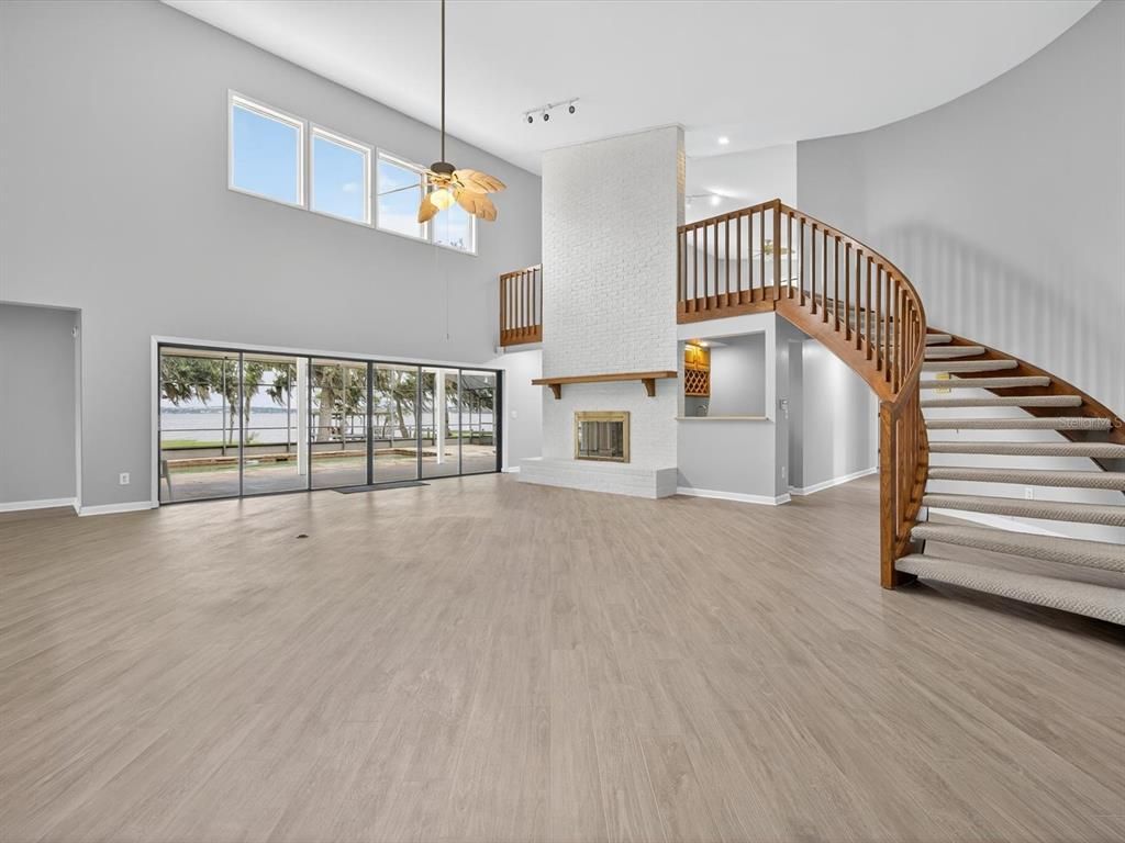 Fireplace, Interior, Pendant Lights, Recessed Lighting, Wood Texture Flooring
