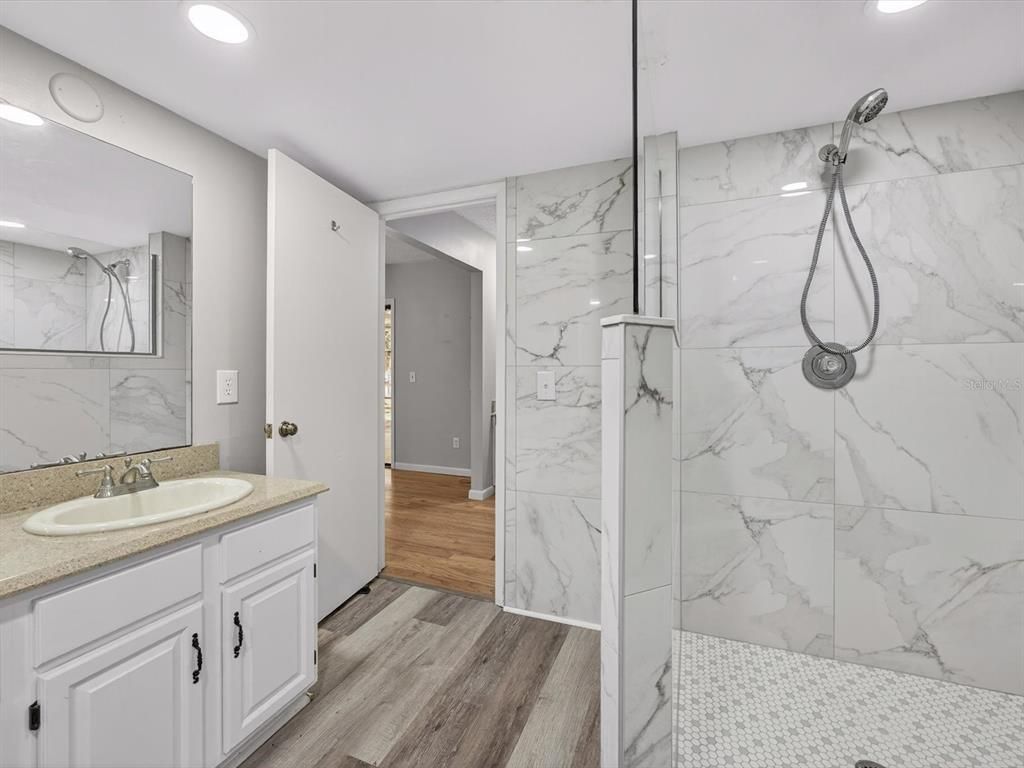 Bathroom, Interior, Marble Walls, Recessed Lighting, Wood Texture Flooring