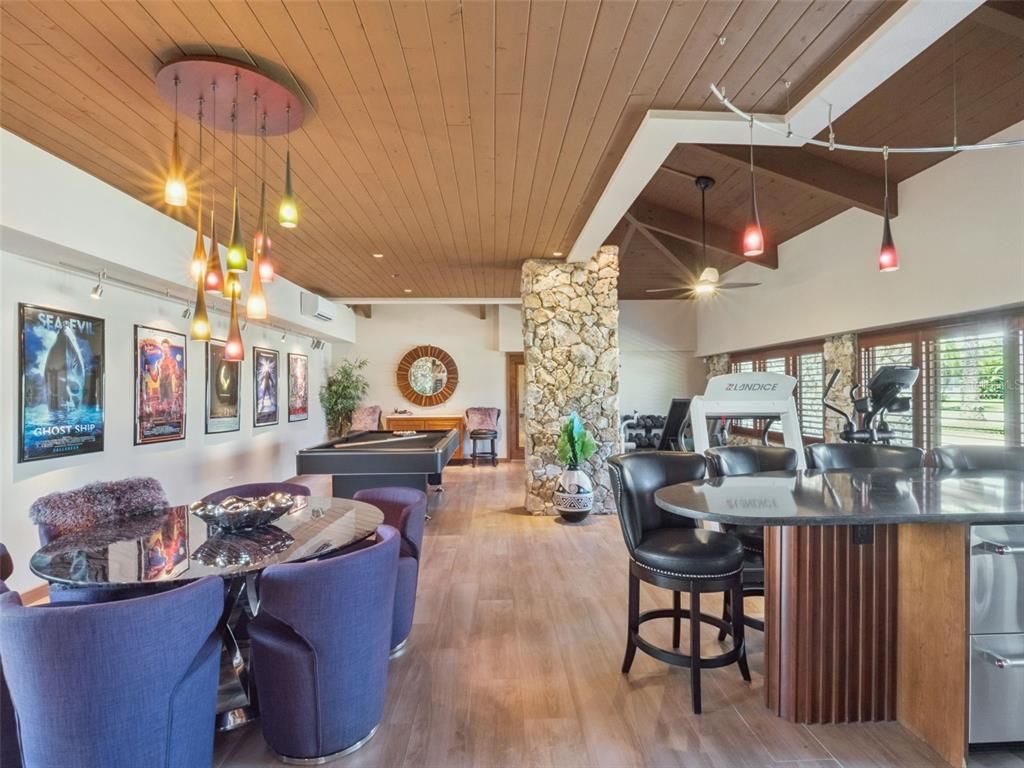 Dining room, Fireplace, Interior, Pendant Lights, Piano, Recessed Lighting, Stone Walls, Wooden Ceilings, Wood Texture Flooring