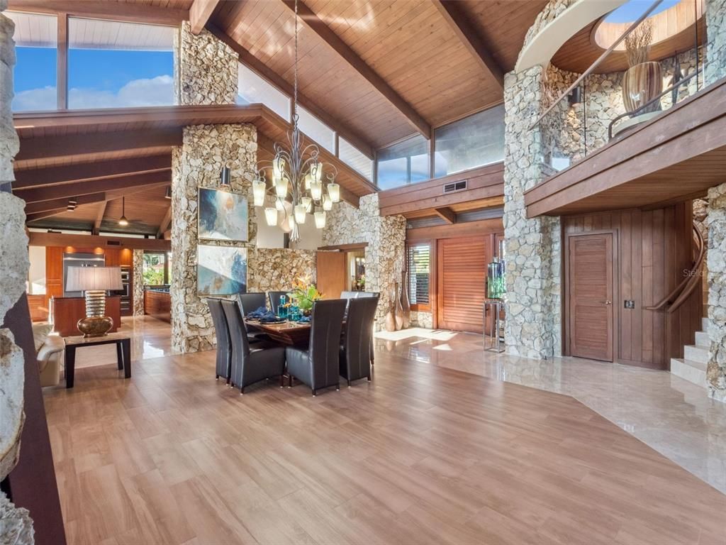 Chandelier, Dining room, Fireplace, Interior, Pendant Lights, Stone Walls, Wooden Beams, Wooden Ceilings, Wood Texture Flooring
