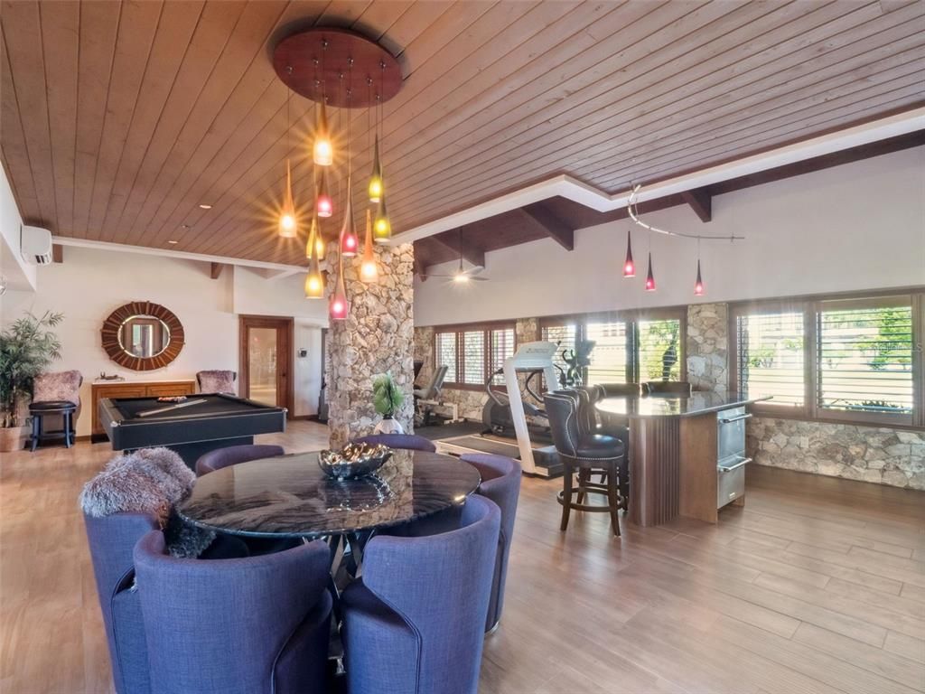 Dining room, Interior, Pendant Lights, Piano, Recessed Lighting, Stone Walls, Wooden Ceilings, Wood Texture Flooring