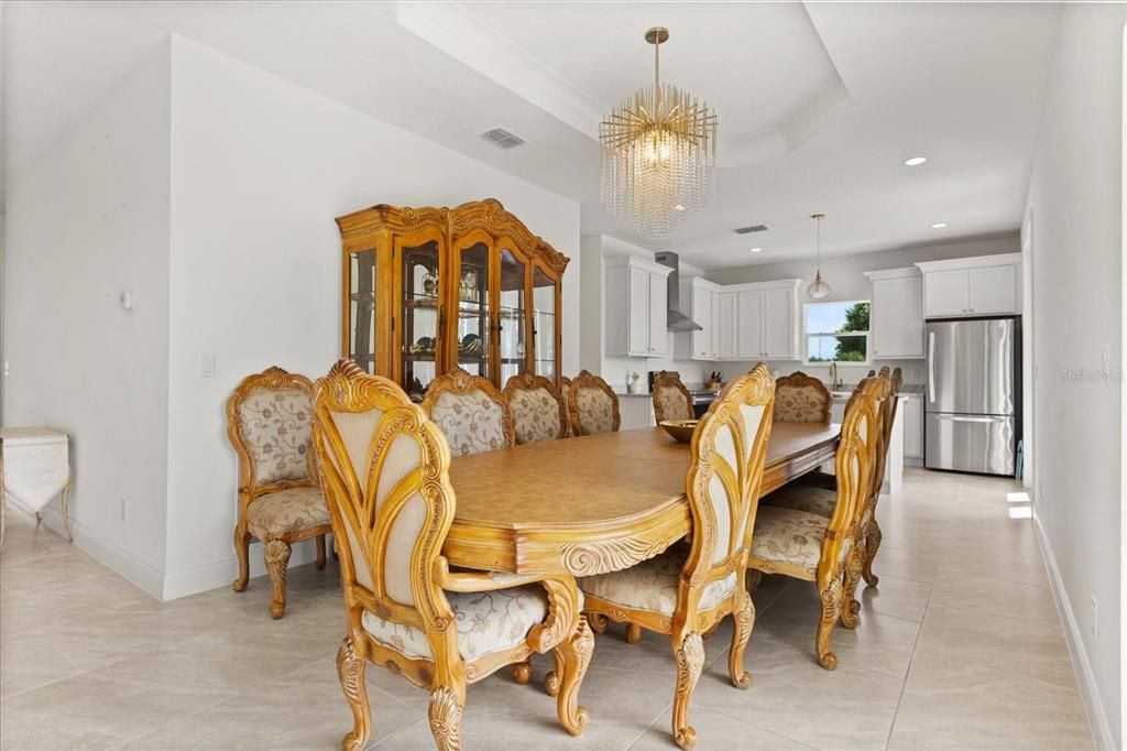 Chandelier, Dining room, Interior, Kitchen, Pendant Lights, Recessed Lighting, Stainless Steel Appliances
