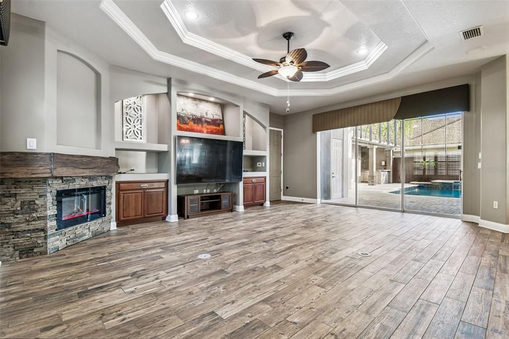 Empty room, Fireplace, Interior, Recessed Lighting, Wood Texture Flooring