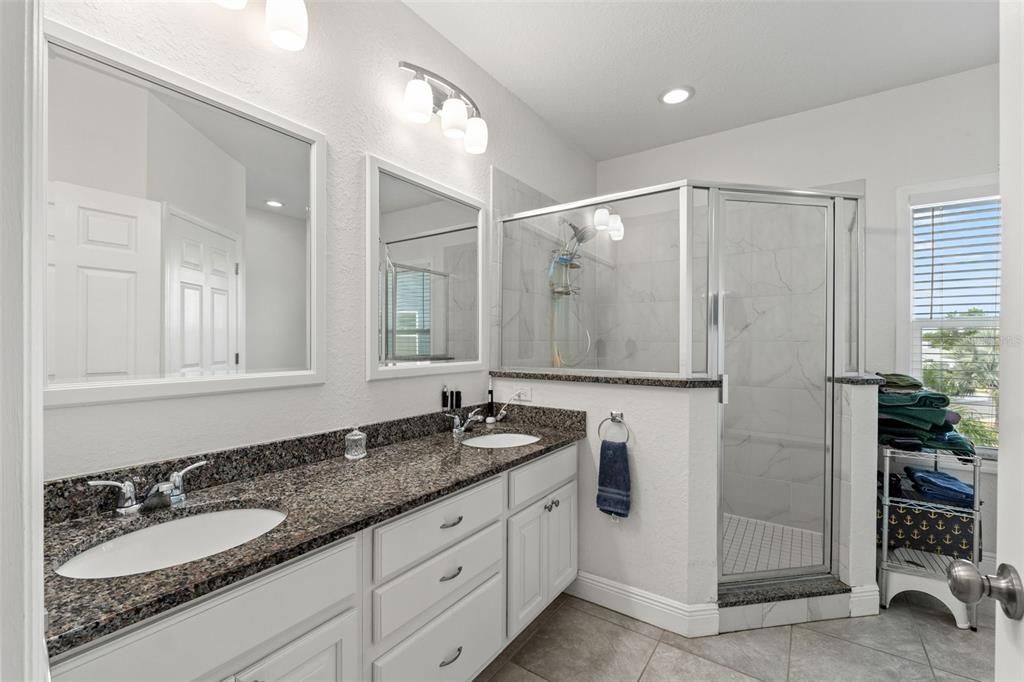 Bathroom, Dual Sink Vanities, Glass Shower, Interior, Marble Walls, Recessed Lighting