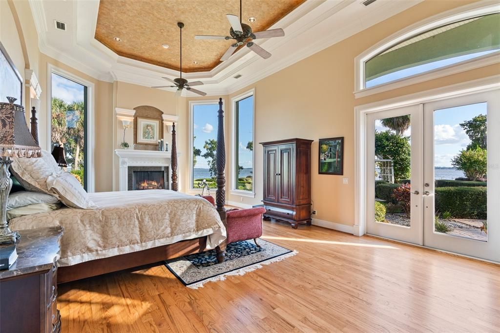 Bedroom, Fireplace, Interior, Recessed Lighting, Water, Wood Texture Flooring