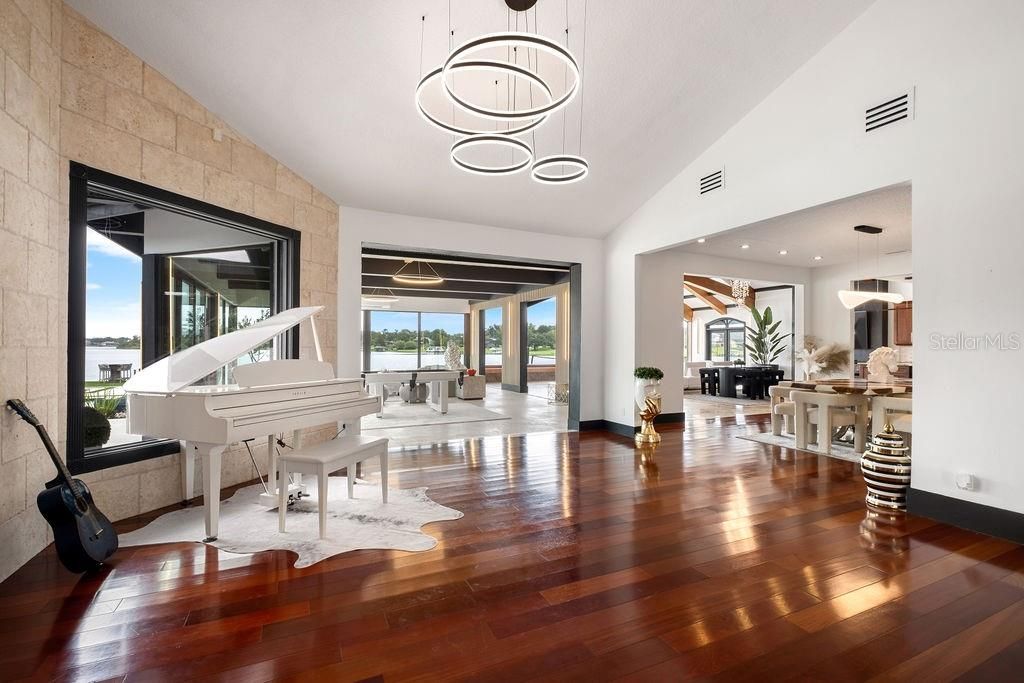 Interior, Kitchen, Pendant Lights, Piano, Recessed Lighting, Stone Walls, Wood Texture Flooring