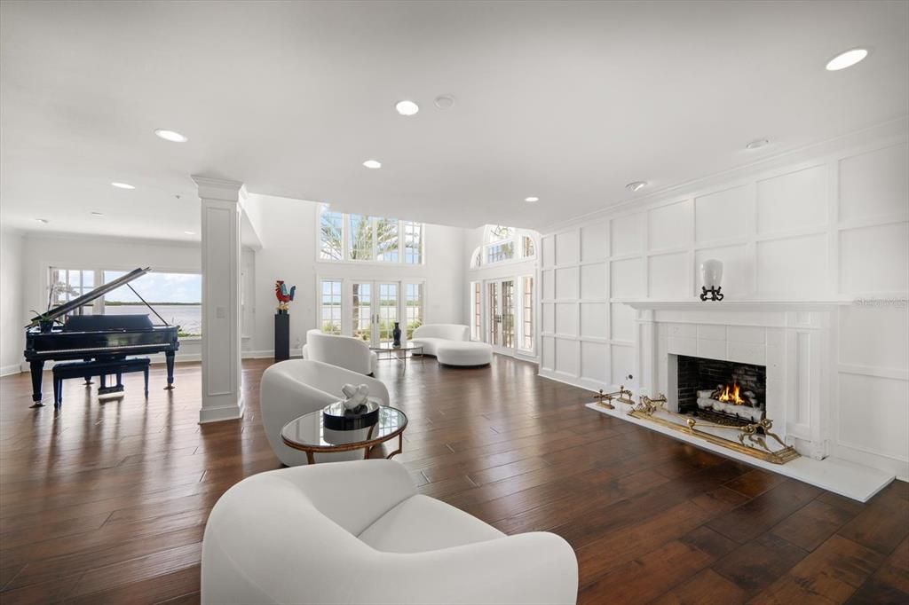 Fireplace, Interior, Living room, Piano, Recessed Lighting, Wood Texture Flooring