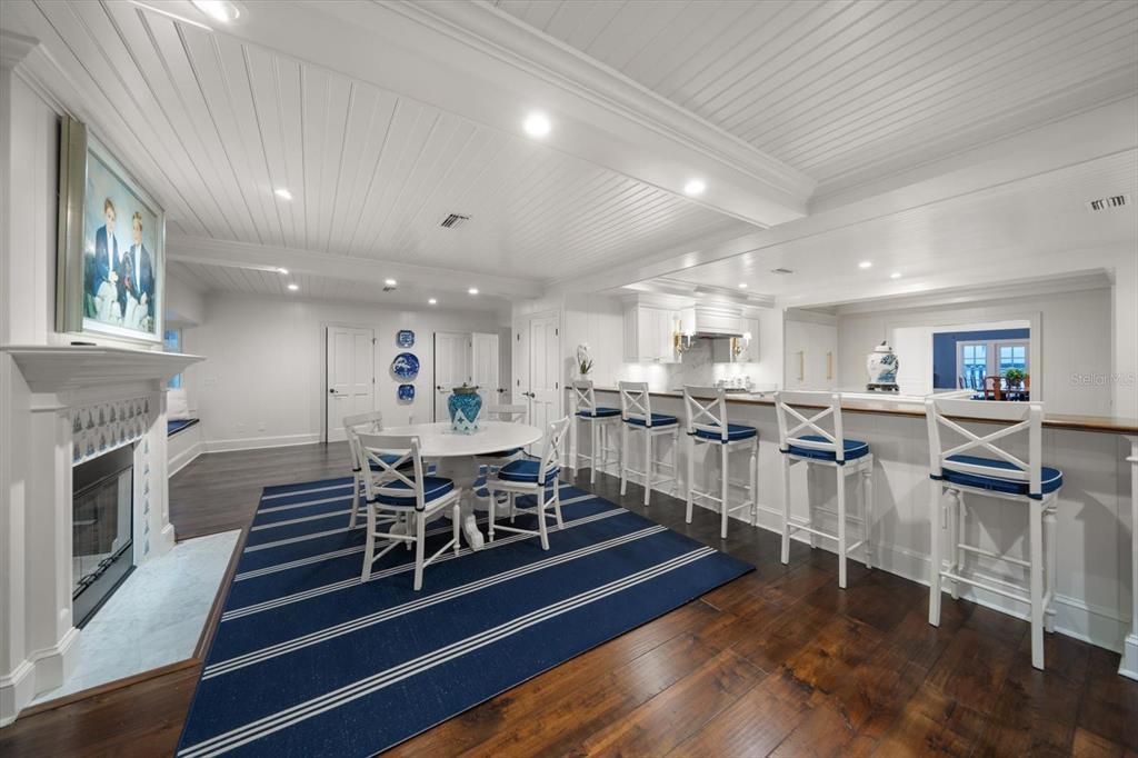 Dining room, Fireplace, Interior, Kitchen, Recessed Lighting, Wood Texture Flooring