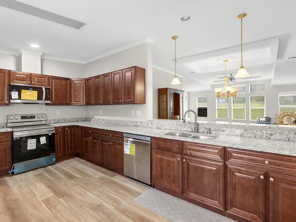 Interior, Kitchen, Pendant Lights, Recessed Lighting, Stainless Steel Appliances, Wood Texture Flooring