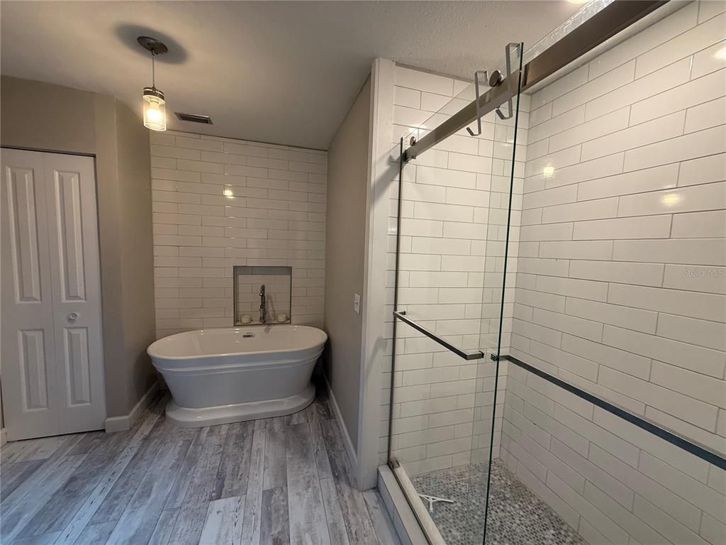 Bathroom, Free Standing Baths, Glass Shower, Interior, Wood Texture Flooring
