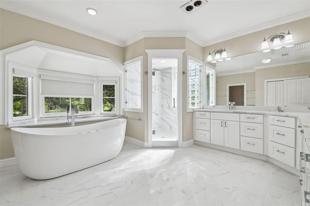 Bathroom, Dual Sink Vanities, Free Standing Baths, Interior, Marble, Marble Walls, Recessed Lighting