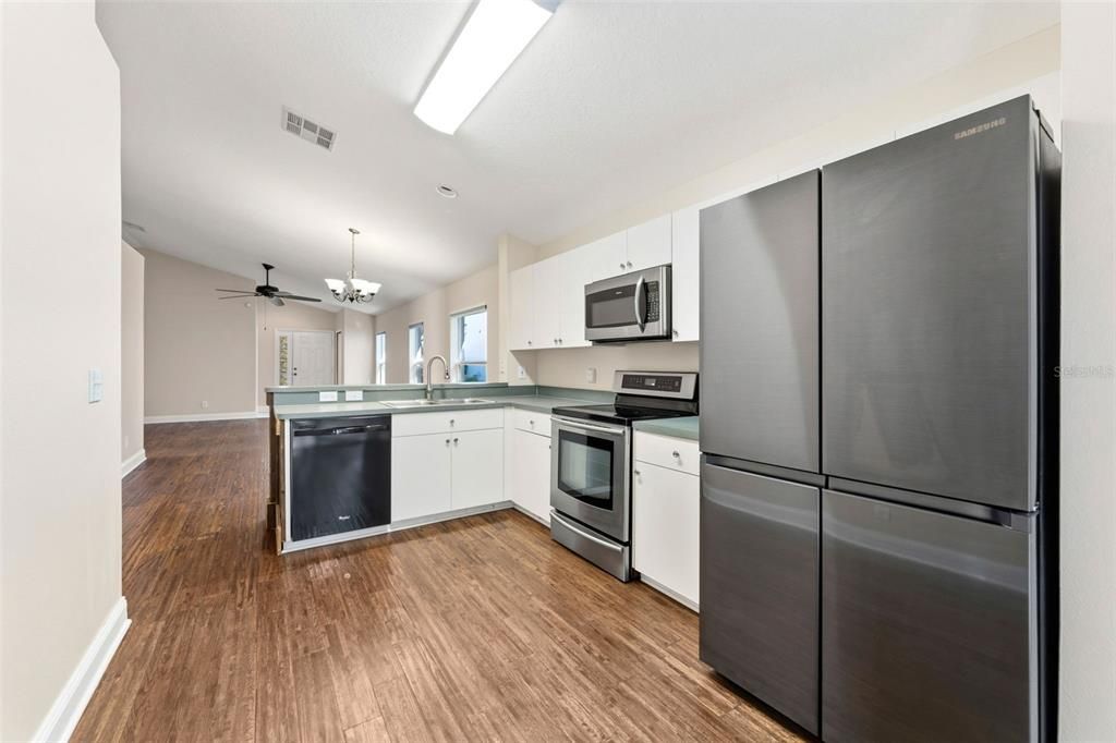 Chandelier, Interior, Kitchen, Stainless Steel Appliances, Wood Texture Flooring