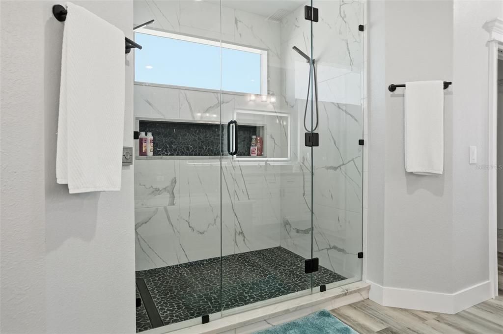 Bathroom, Glass Shower, Interior, Marble Walls, Wood Texture Flooring