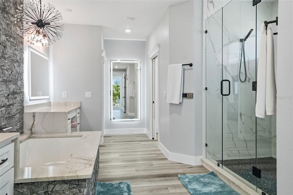 Bathroom, Glass Shower, Interior, Marble Walls, Recessed Lighting, Wood Texture Flooring