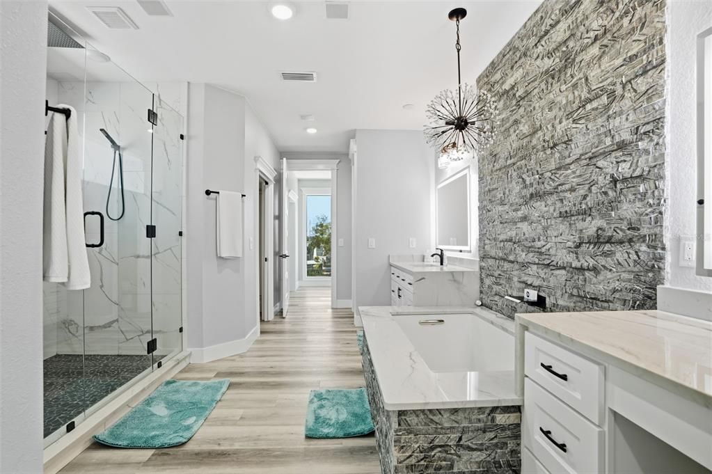 Bathroom, Glass Shower, Interior, Marble Walls, Pendant Lights, Recessed Lighting, Wood Texture Flooring