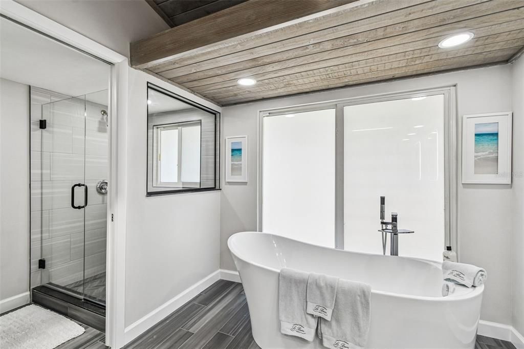 Bathroom, Free Standing Baths, Glass Shower, Interior, Recessed Lighting, Wooden Ceilings, Wood Texture Flooring