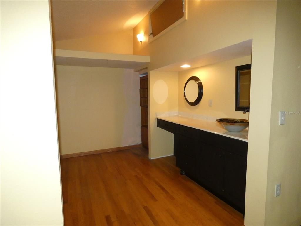 Bathroom, Dual Sink Vanities, Interior, Recessed Lighting, Wood Texture Flooring