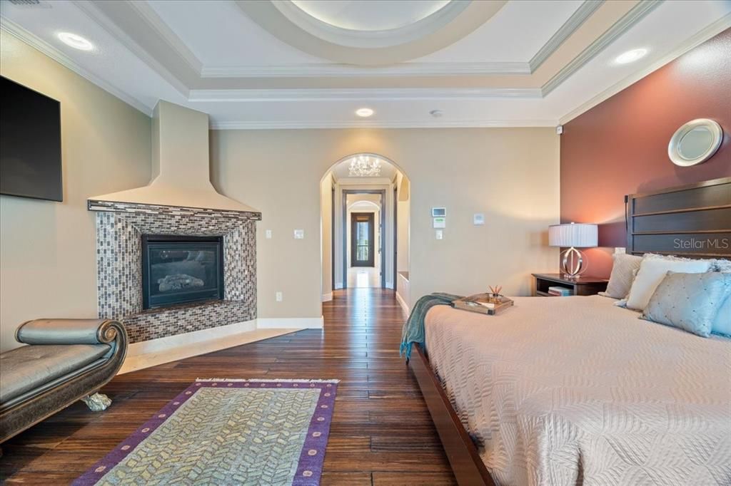 Bedroom, Fireplace, Interior, Recessed Lighting, Wood Texture Flooring