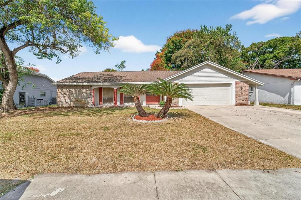 Attached, Backyard, Exterior, Facade, Brick Facade, Ranch