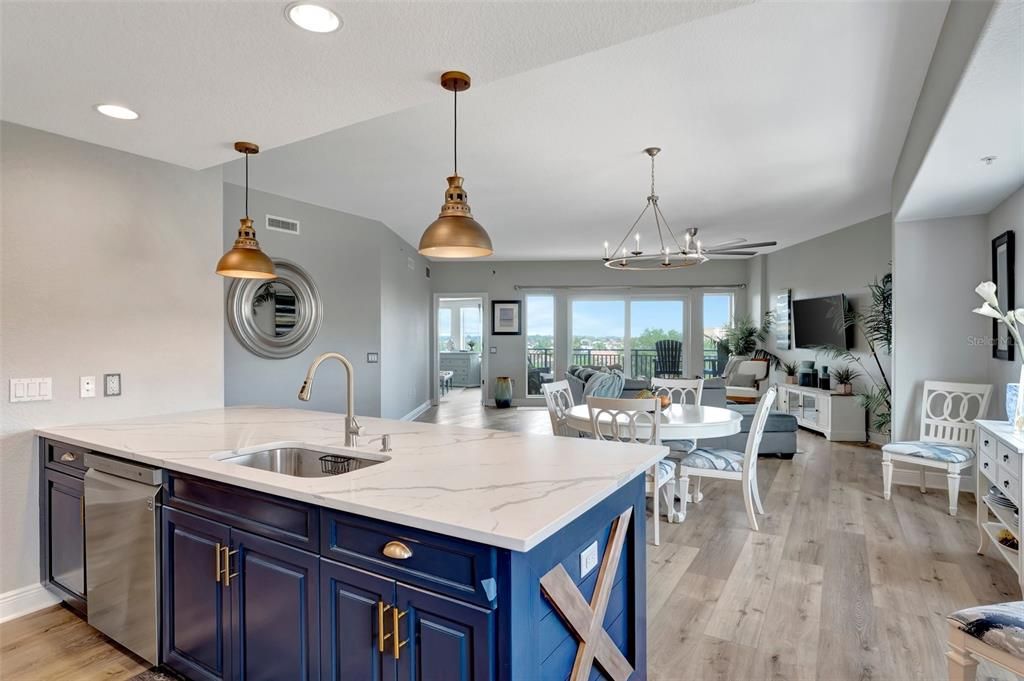 Dining room, Interior, Kitchen, Living room, Pendant Lights, Recessed Lighting, Stainless Steel Appliances, Wood Texture Flooring