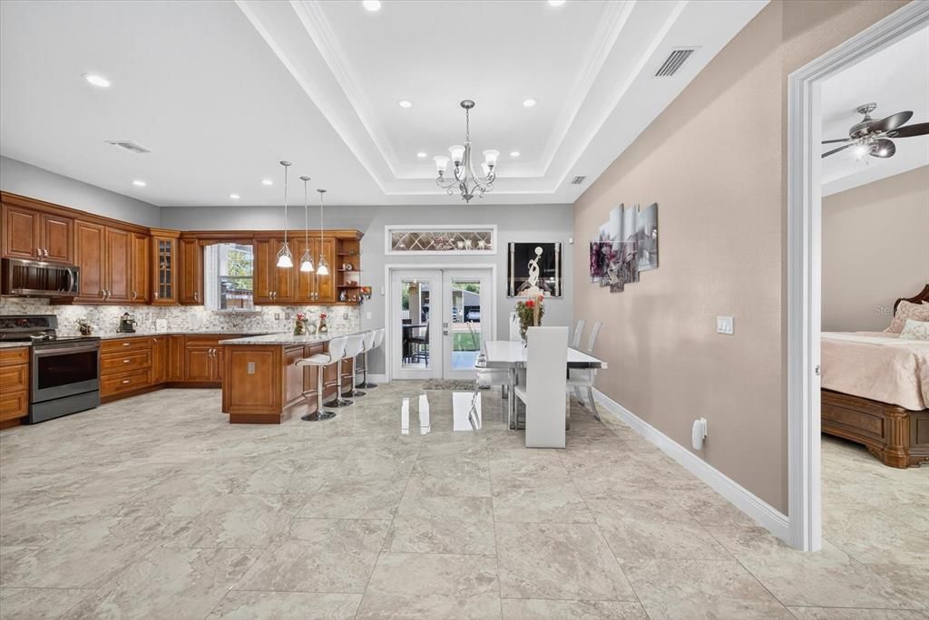 Bedroom, Chandelier, Dining room, Interior, Kitchen, Pendant Lights, Recessed Lighting, Stainless Steel Appliances