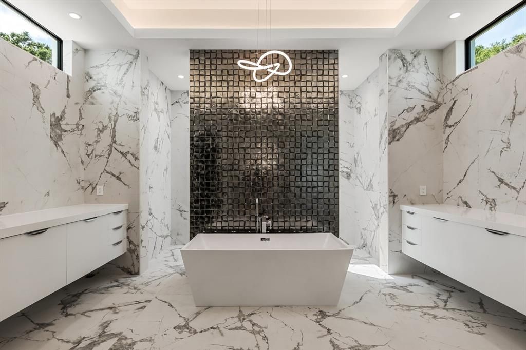 Bathroom, Free Standing Baths, Interior, Marble, Marble Walls, Pendant Lights, Recessed Lighting