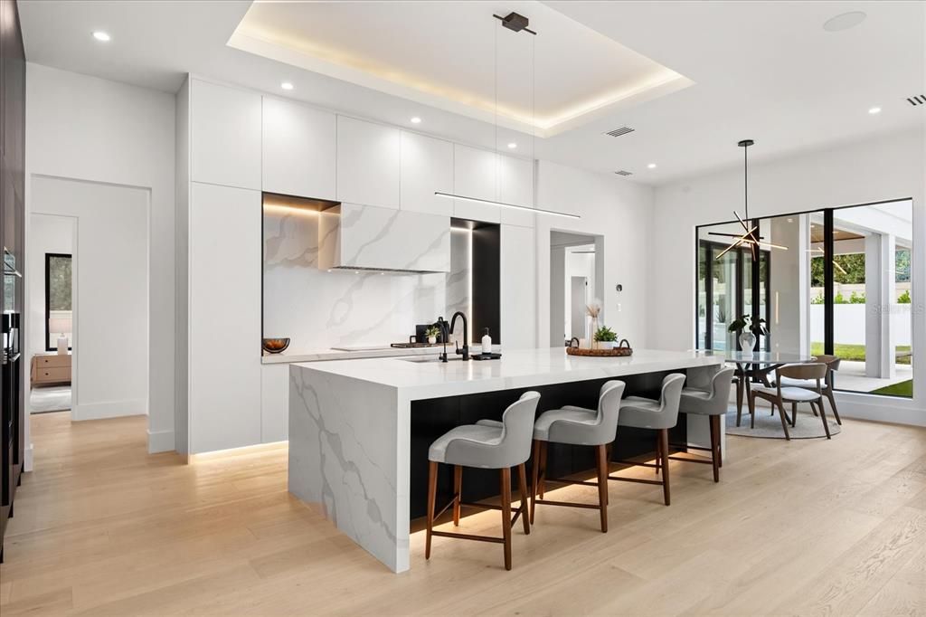 Dining room, Interior, Kitchen, Marble Walls, Pendant Lights, Recessed Lighting, Wood Texture Flooring