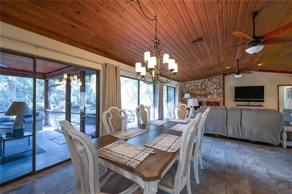 Chandelier, Dining room, Fireplace, Interior, Living room, Recessed Lighting, Wooden Ceilings