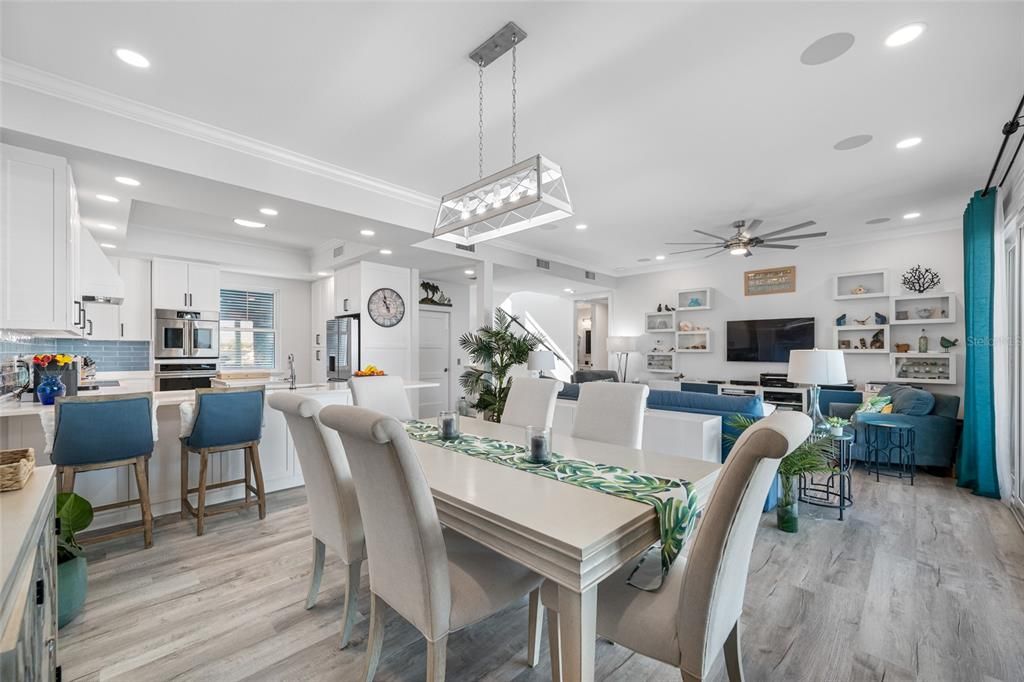 Dining room, Interior, Kitchen, Living room, Pendant Lights, Recessed Lighting, Stainless Steel Appliances, Wood Texture Flooring