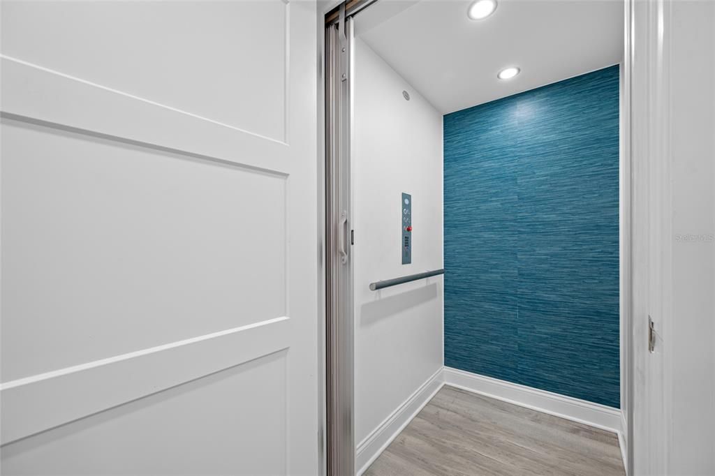 Elevator, Interior, Recessed Lighting, Wood Texture Flooring
