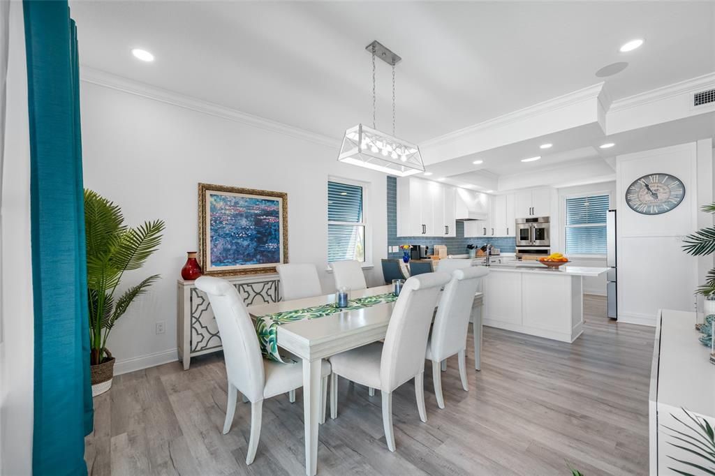 Dining room, Interior, Kitchen, Pendant Lights, Recessed Lighting, Stainless Steel Appliances, Wood Texture Flooring