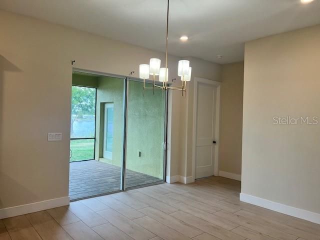 Chandelier, Empty room, Interior, Pendant Lights, Recessed Lighting, Wood Texture Flooring