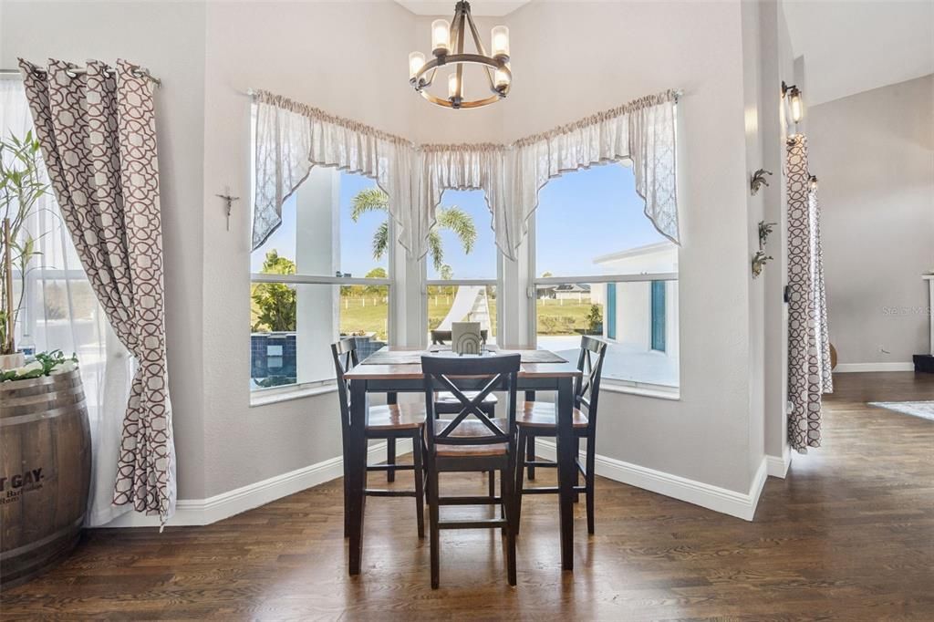 Chandelier, Dining room, Interior, Pendant Lights, Wood Texture Flooring
