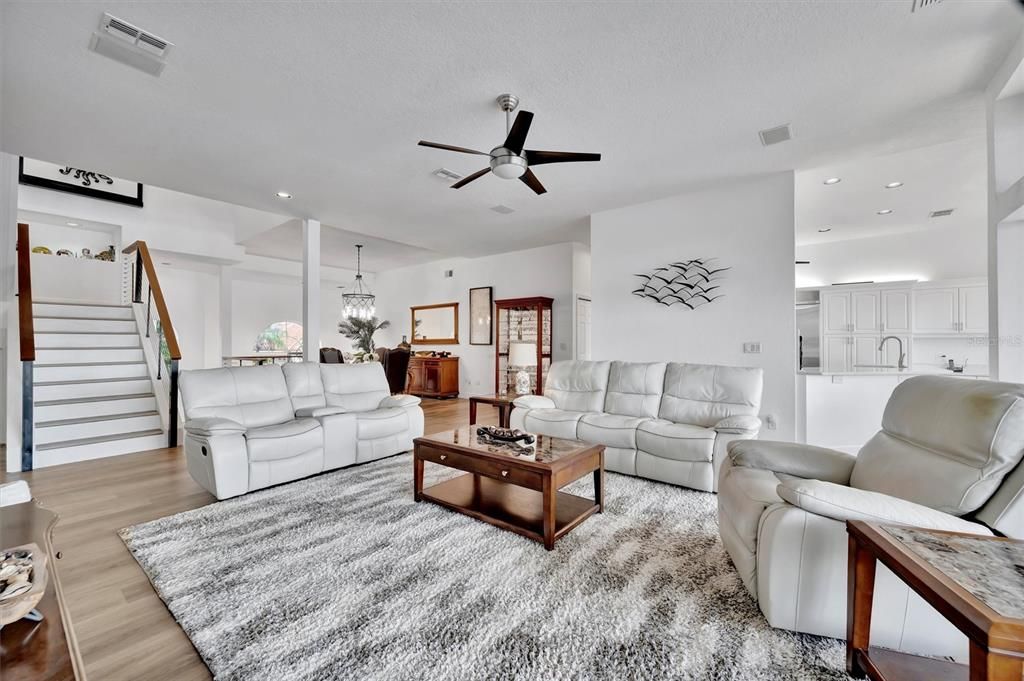 Chandelier, Dining room, Interior, Living room, Pendant Lights, Recessed Lighting, Wood Texture Flooring