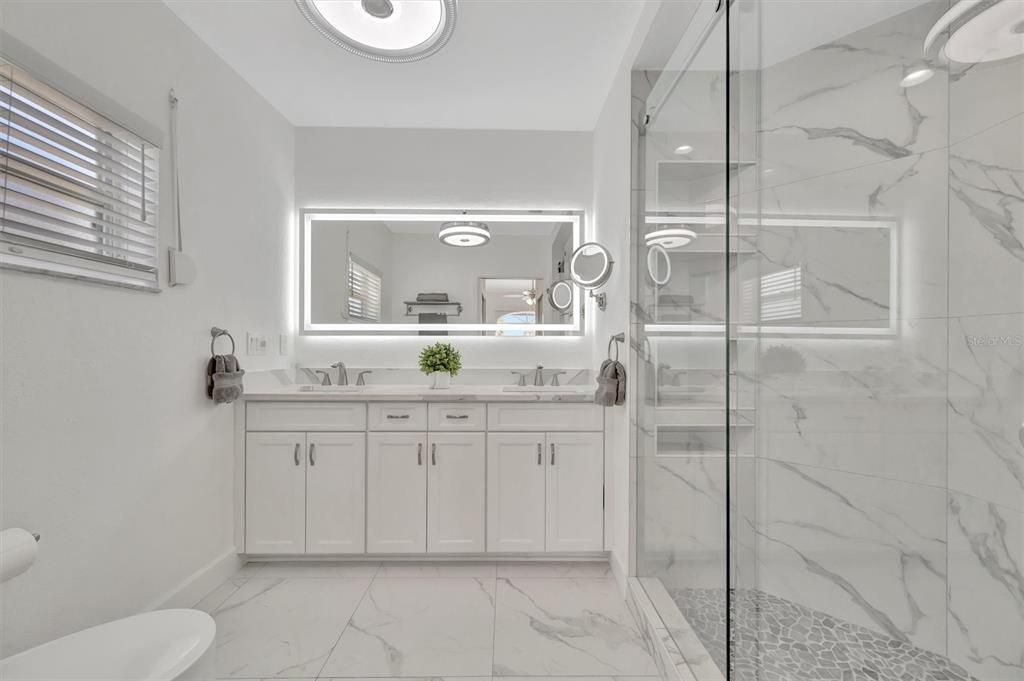 Bathroom, Dual Sink Vanities, Glass Shower, Interior, Marble, Marble Walls