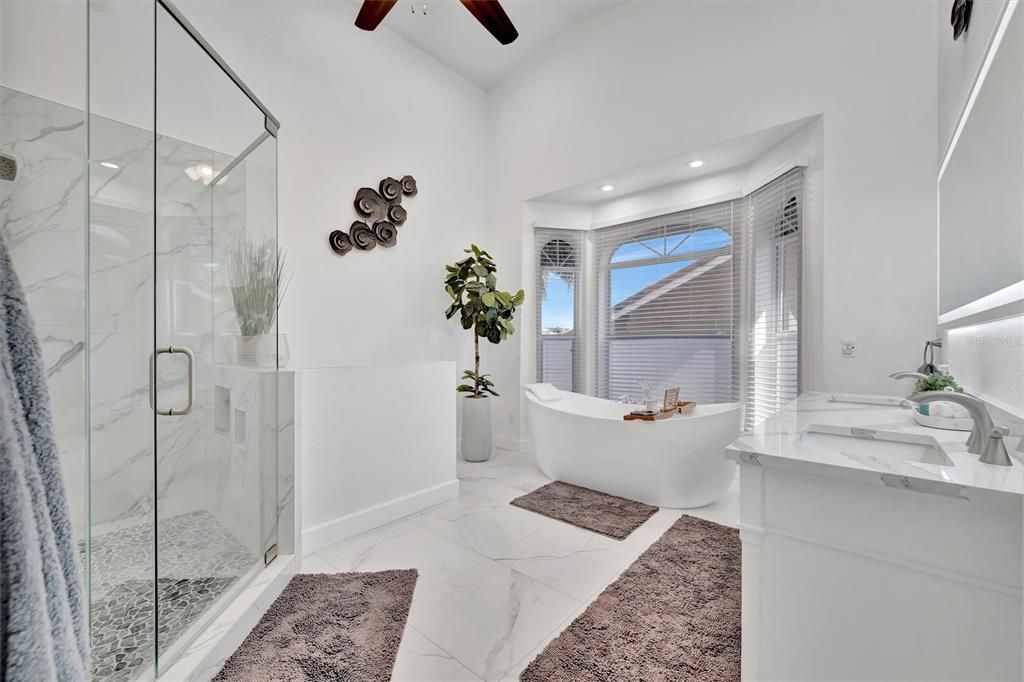 Bathroom, Dual Sink Vanities, Free Standing Baths, Glass Shower, Interior, Marble, Marble Walls, Recessed Lighting