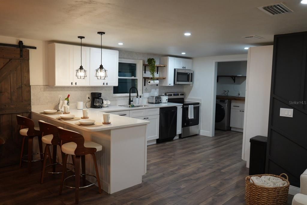 Interior, Kitchen, Pendant Lights, Recessed Lighting, Stainless Steel Appliances, Washer, Wood Texture Flooring