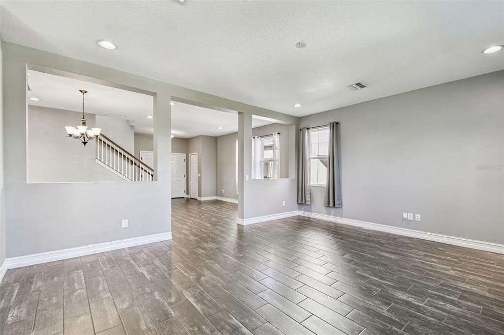 Chandelier, Empty room, Interior, Recessed Lighting, Wood Texture Flooring
