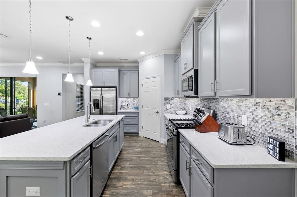 Interior, Kitchen, Pendant Lights, Recessed Lighting, Stainless Steel Appliances, Wood Texture Flooring