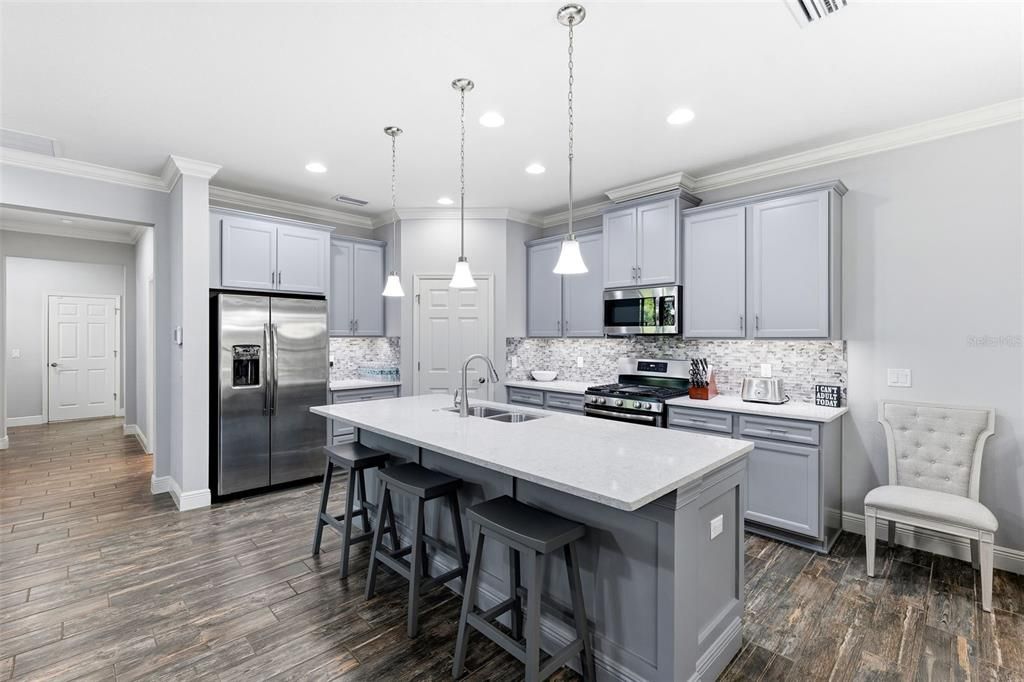 Interior, Kitchen, Pendant Lights, Recessed Lighting, Stainless Steel Appliances, Wood Texture Flooring