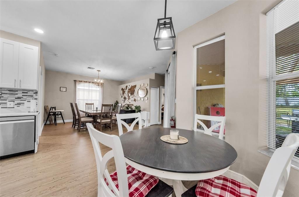 Chandelier, Dining room, Interior, Pendant Lights, Recessed Lighting, Wood Texture Flooring