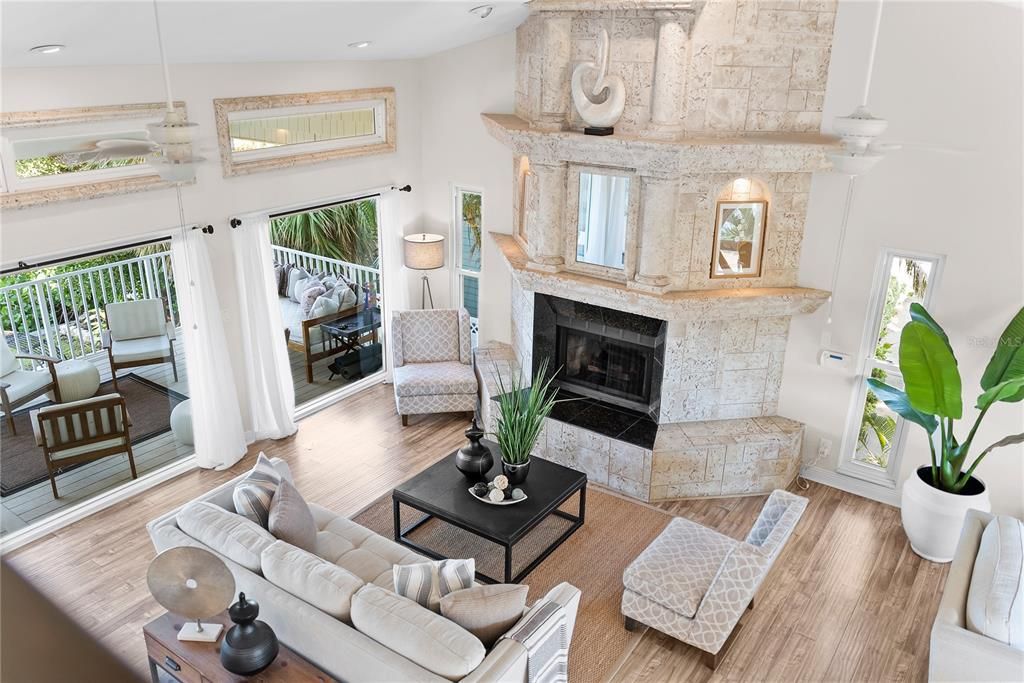 Fireplace, Interior, Living room, Recessed Lighting, Stone Walls, Wood Texture Flooring