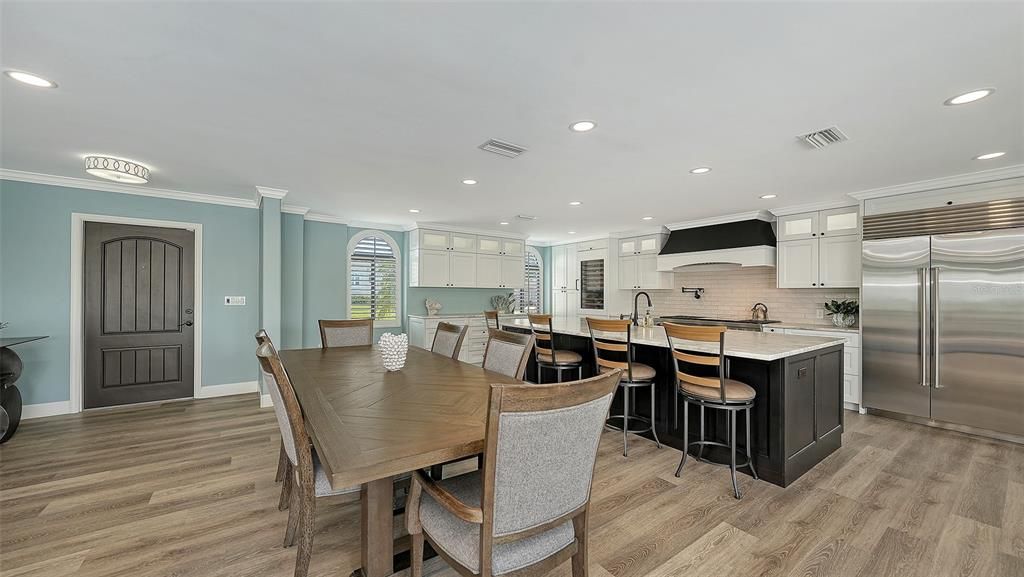 Dining room, Interior, Kitchen, Recessed Lighting, Stainless Steel Appliances, Wood Texture Flooring