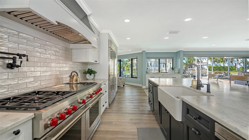 Interior, Kitchen, Recessed Lighting, Stainless Steel Appliances, Stone Walls, Wood Texture Flooring