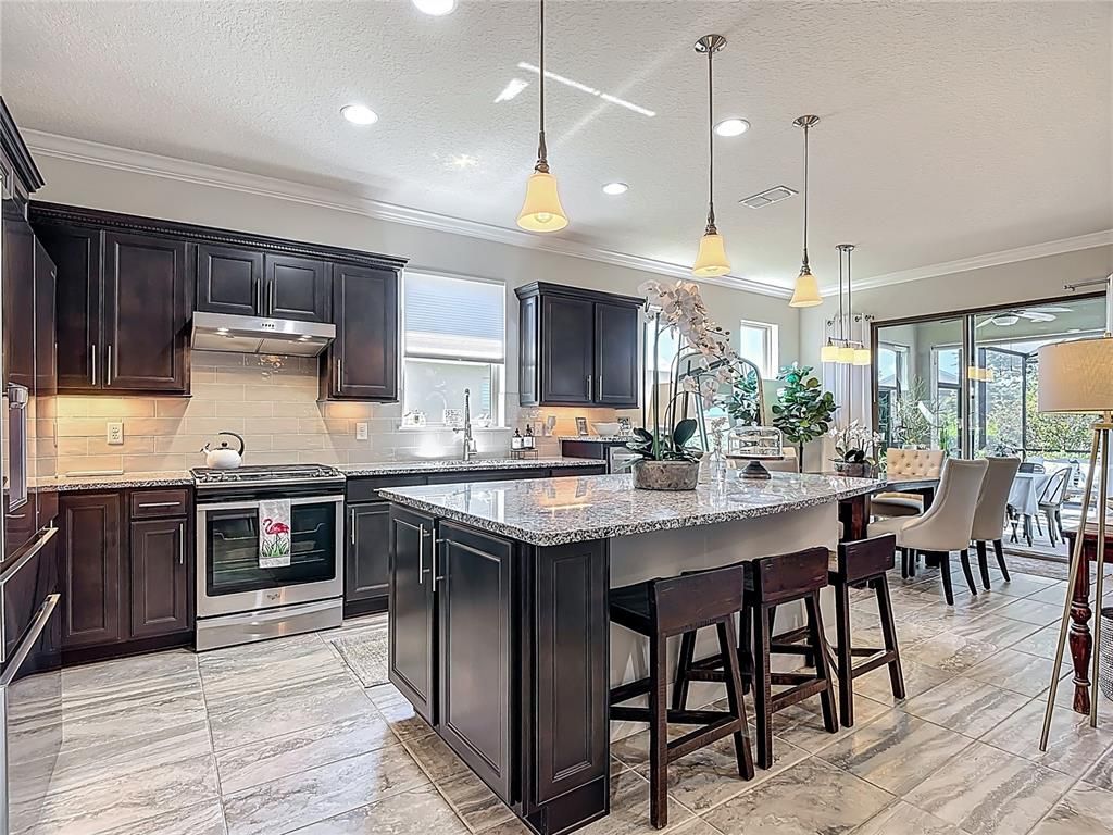 Dining room, Interior, Kitchen, Marble, Pendant Lights, Recessed Lighting, Stainless Steel Appliances