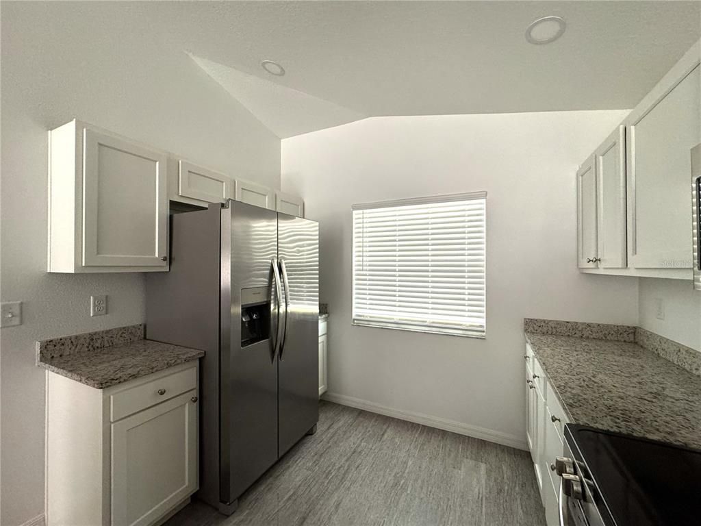 Interior, Kitchen, Pendant Lights, Washer, Wood Texture Flooring