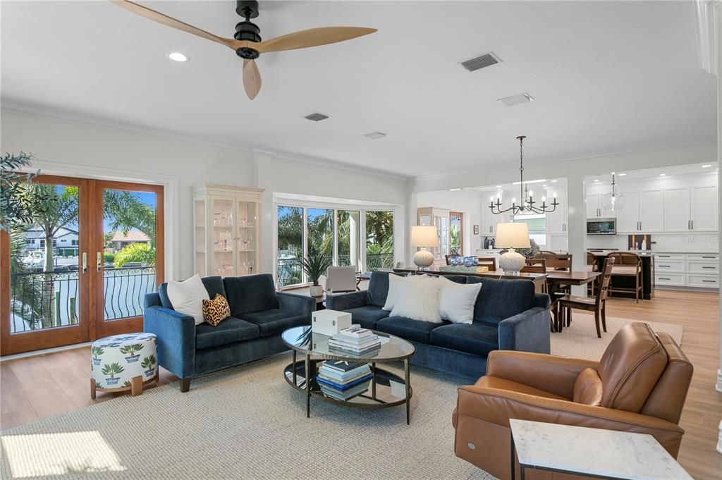 Chandelier, Dining room, Interior, Kitchen, Living room, Pendant Lights, Recessed Lighting, Wood Texture Flooring