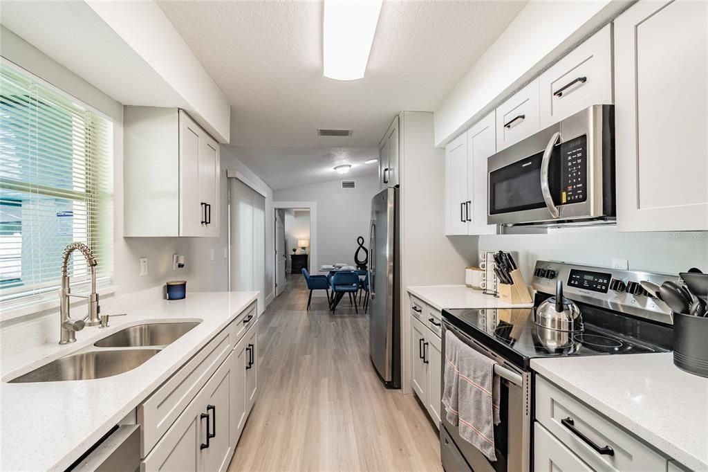 Dining room, Interior, Kitchen, Stainless Steel Appliances, Wood Texture Flooring