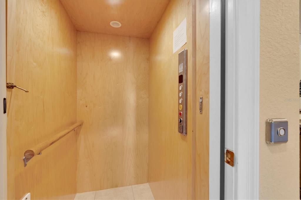 Elevator, Interior, Recessed Lighting, Wooden Ceilings, Wooden Walls