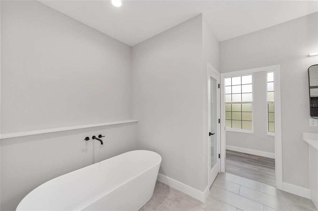 Bathroom, Free Standing Baths, Interior, Recessed Lighting, Wood Texture Flooring